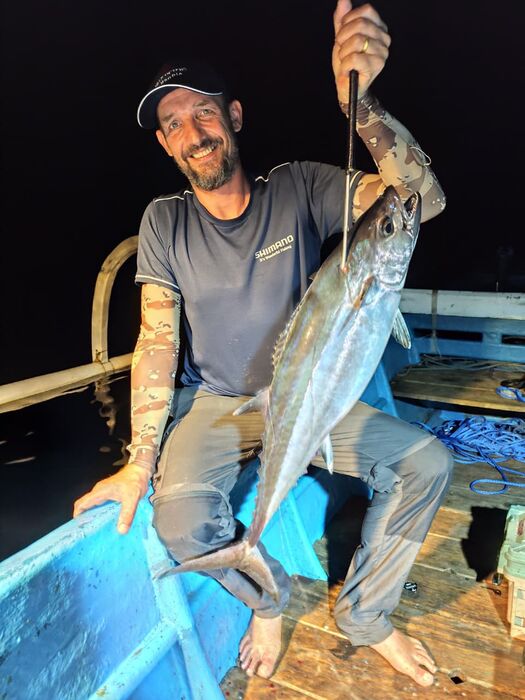 Young angler holding a Mahi Mahi catch