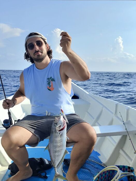 Guest with a large catch on a night fishing trip